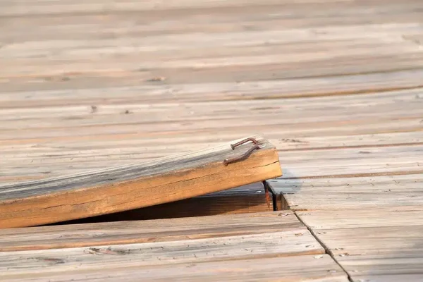 Weak Deck Fasteners - Tighten Boards Before Safety Problems